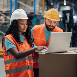 warehouse workers using laptop checking inventory 2024 10 09 17 52 02 utc 2048x1365